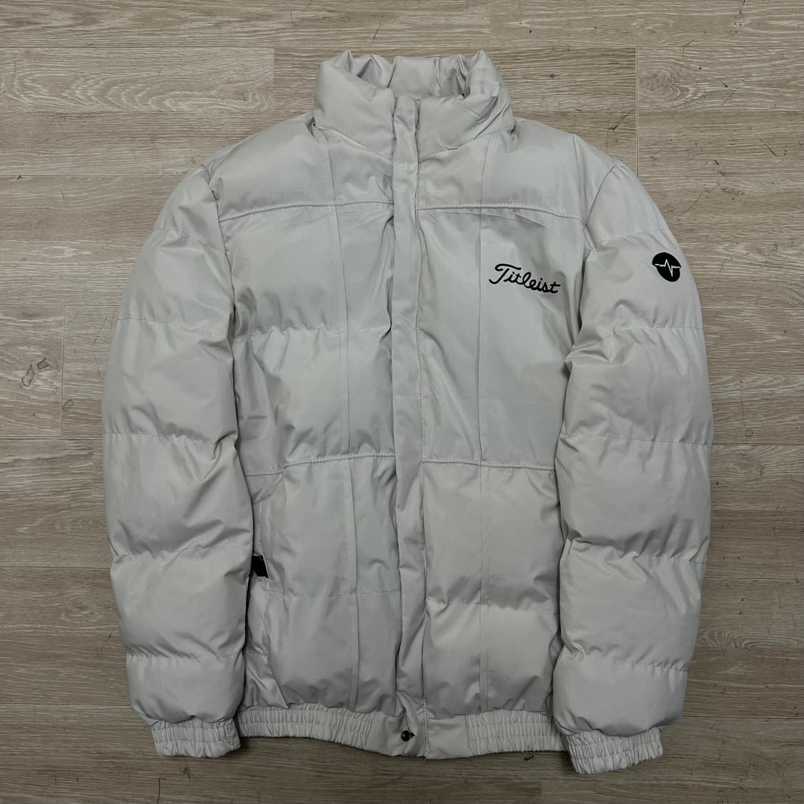 타이틀리스트 골프웨어 와펜 하이넥 패딩 점퍼 [아이보리] 2XL/110 상품이미지1