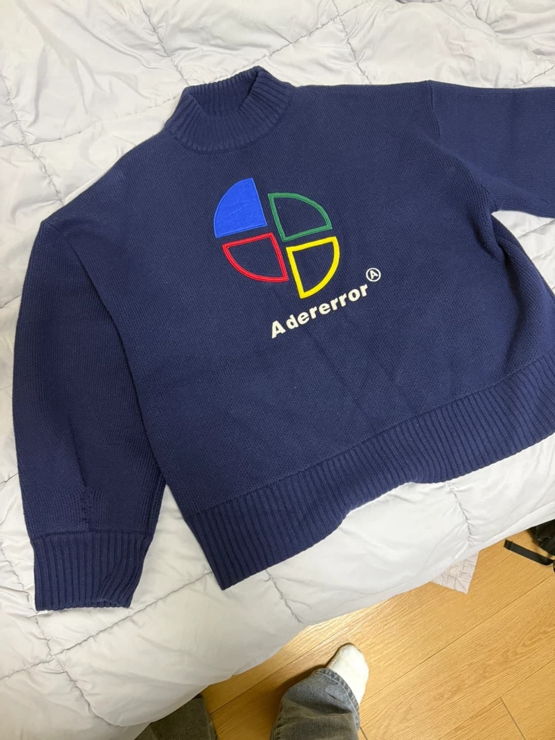 아더에러 슬라이스 니트 네이비 상품이미지1