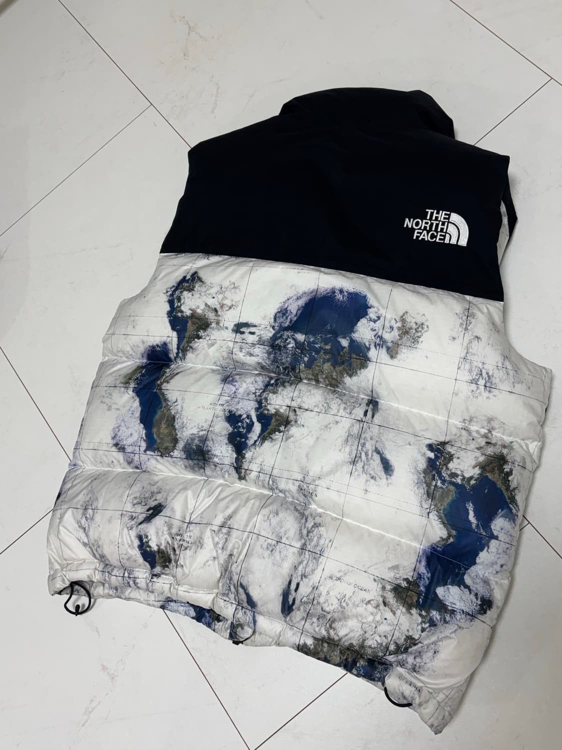 노스페이스 눕시 화이트라벨 노벨티 지구 조끼패딩 상품이미지3
