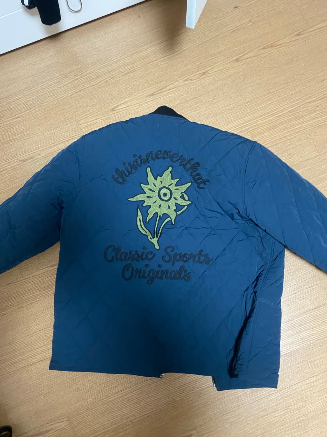 디스이스네버댓 경량패딩  상품이미지1