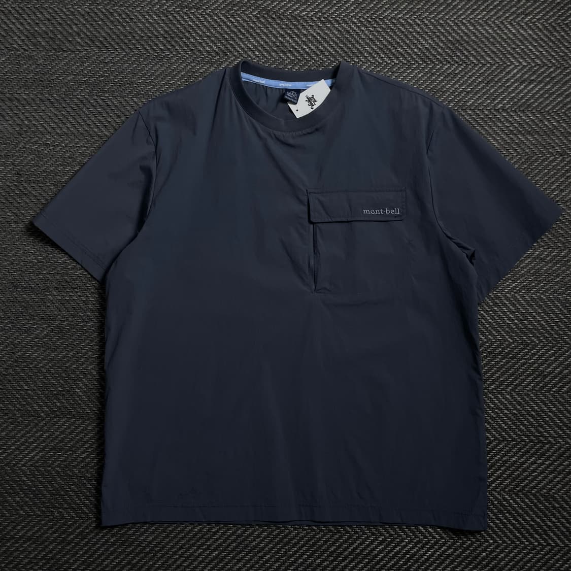 몽벨 아치로고 나일론 포켓 반팔 우븐 웜업o 4199 상품이미지1