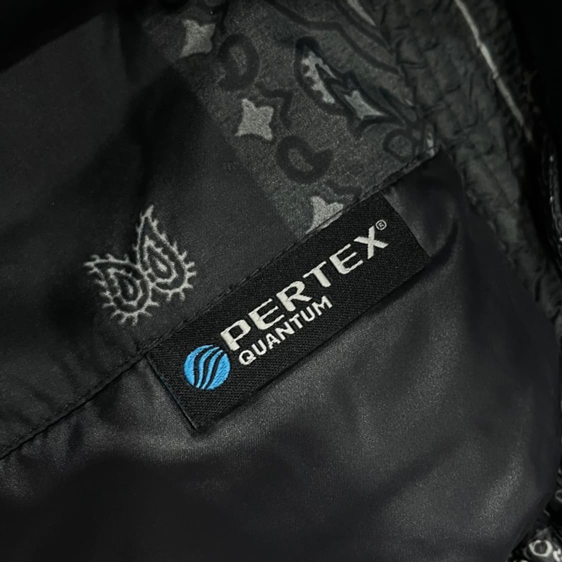 100 디스이즈네버댓 퍼텍스 패딩 상품이미지5