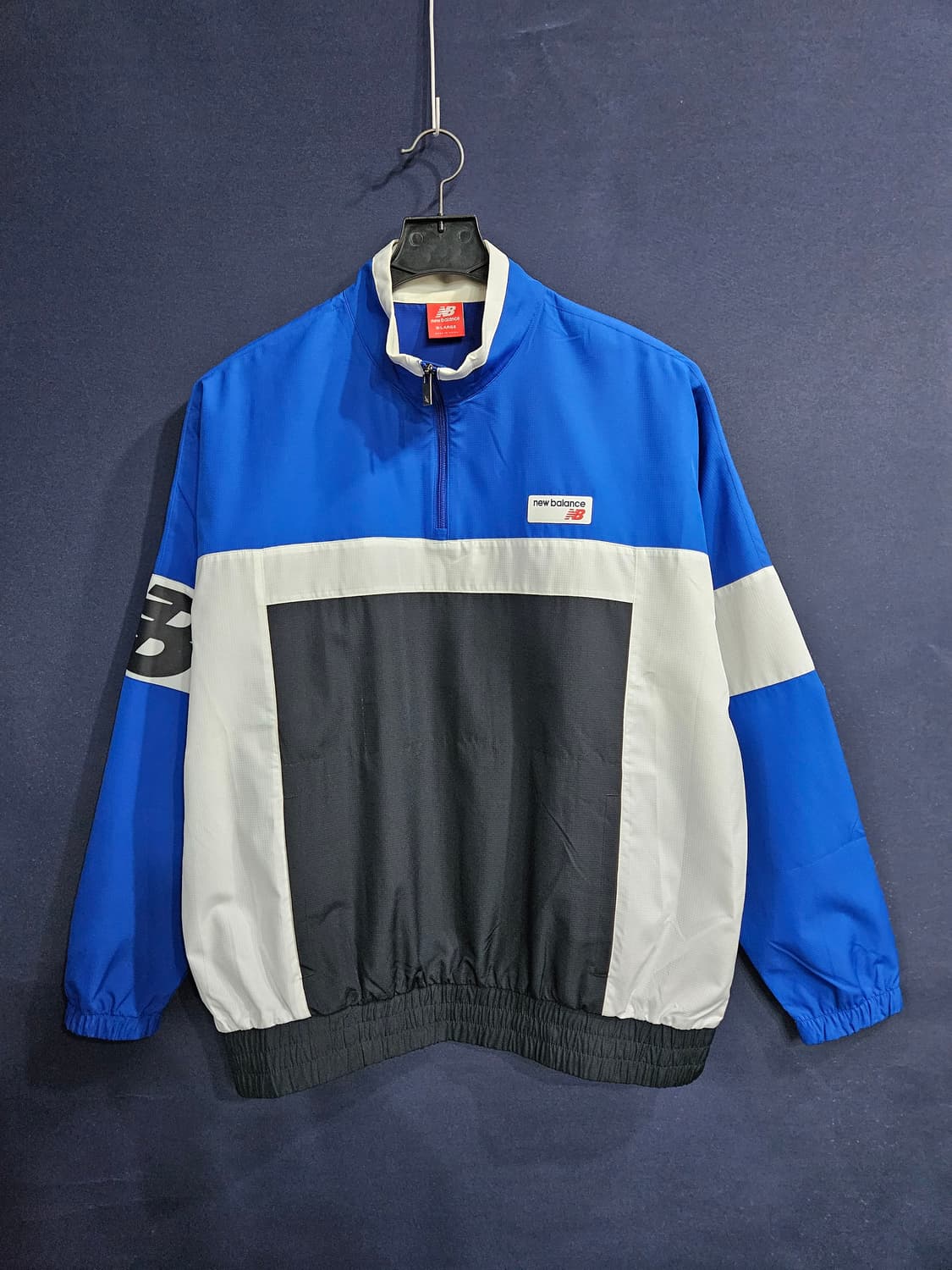 뉴발란스 프린팅 배색 남성 오버핏 105 반집업 바람막이  상품이미지1