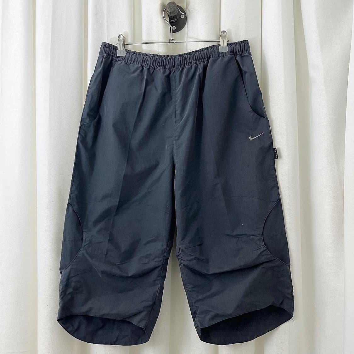 나이키 네이비 폴리 8부 밴딩 팬츠 상품이미지1