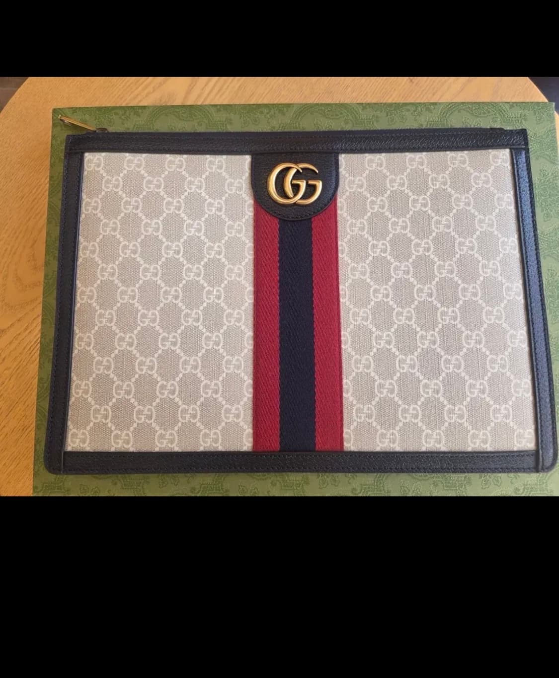 구찌 오피디아 GG 수프림 클러치 상품이미지1