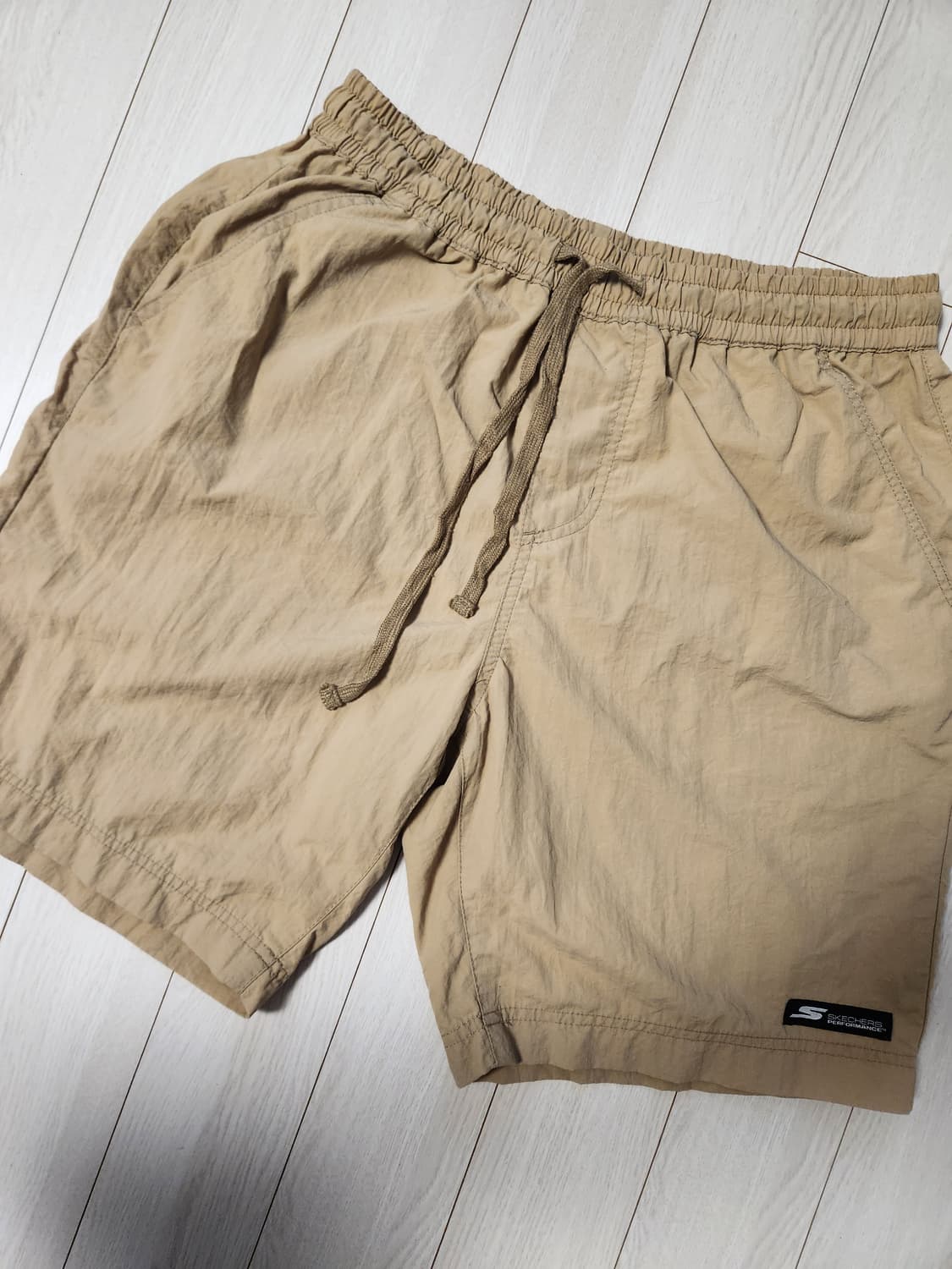 스케쳐스 퍼포먼스 베이지색 밴딩 반바지 사이즈32 L

사용감 좀 많아서 상품이미지1