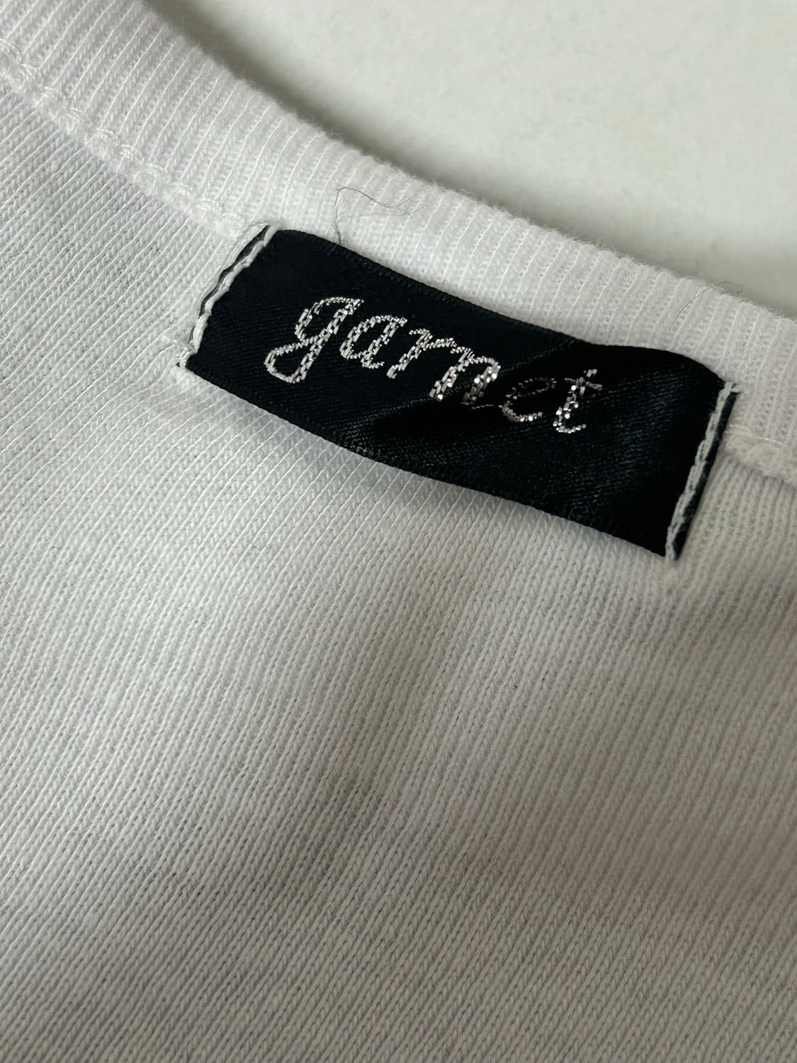 Garnet 골드윙 스컬 프린팅 큐빅 글리터 탑 상품이미지5