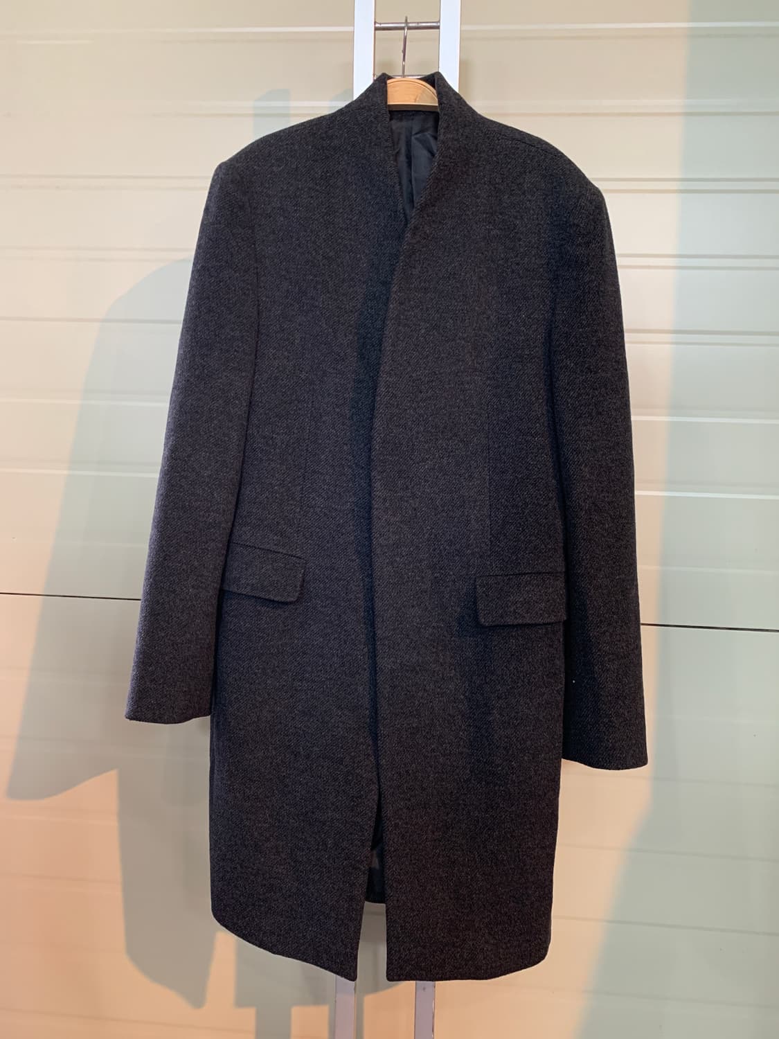 리버클래시의 감각적인 미니멀 울 코트 상품이미지1