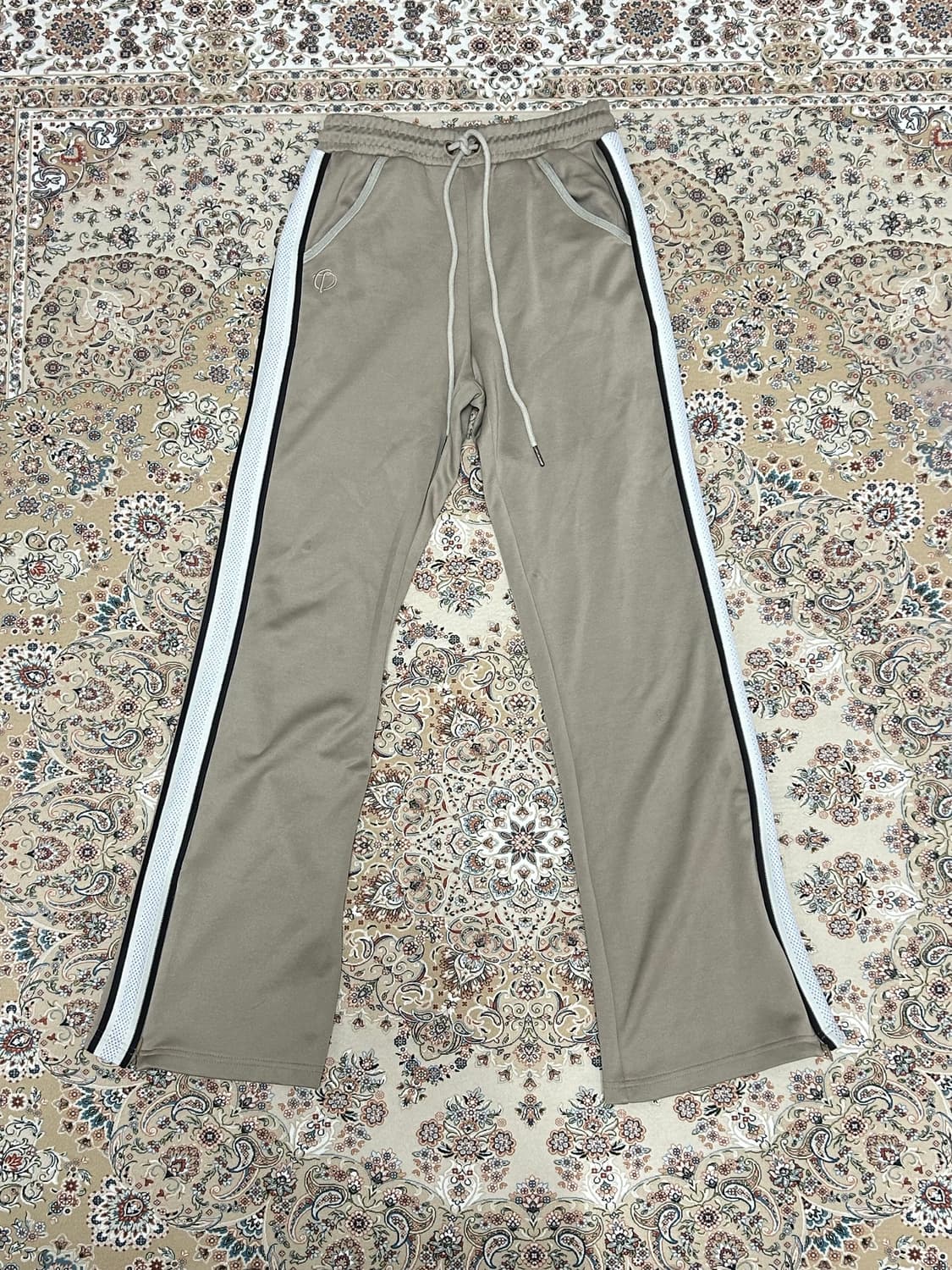 더오픈프로덕트 테이프드 저지 트랙팬츠 베이지1 상품이미지1