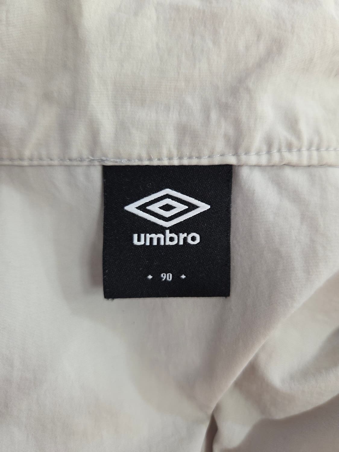 엄브로(UMBRO) 우븐 하프집업 반팔 아노락 상품이미지6
