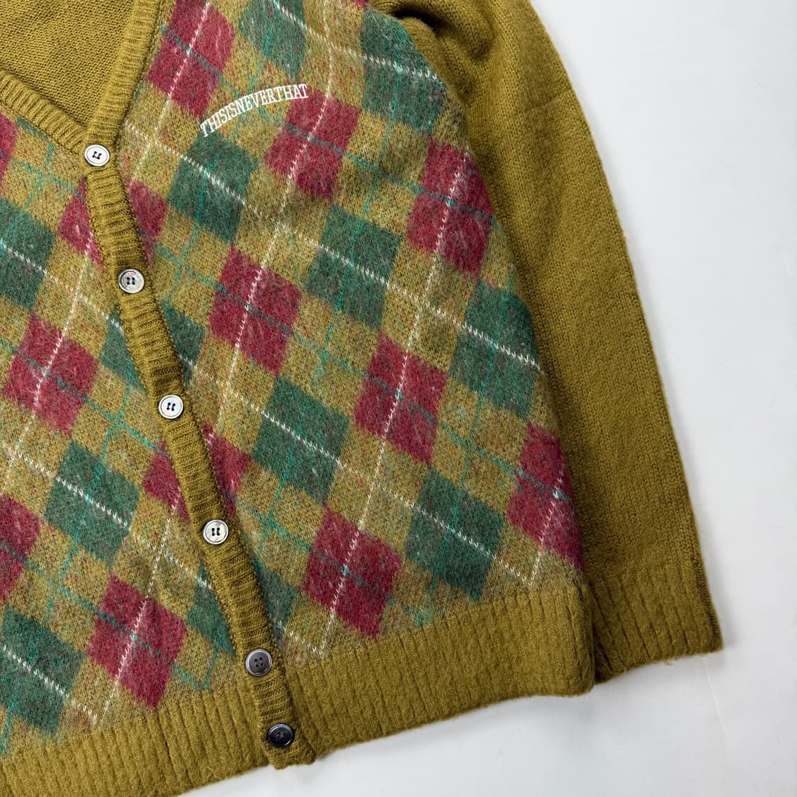 디스이즈네버댓 아가일패턴 니트 가디건 상품이미지4