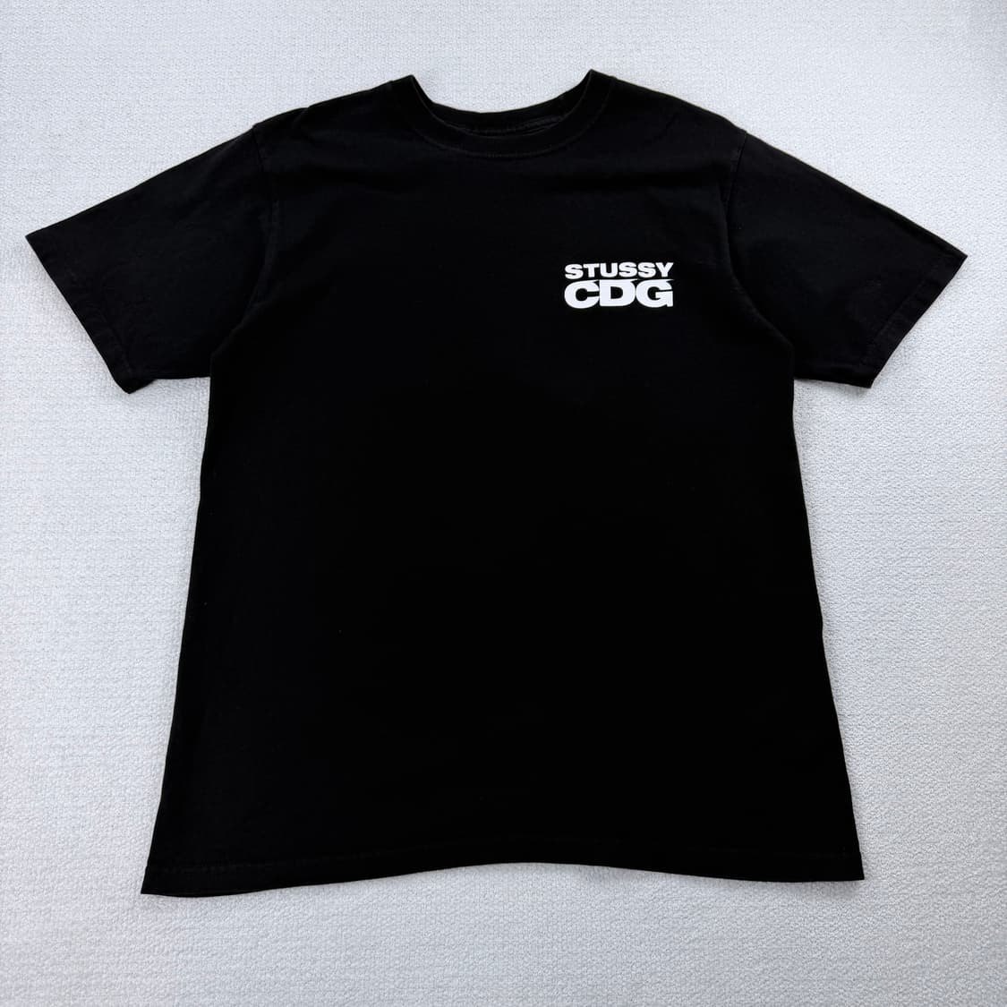 스투시 x CDG 서프맨 반팔 티셔츠 상품이미지1