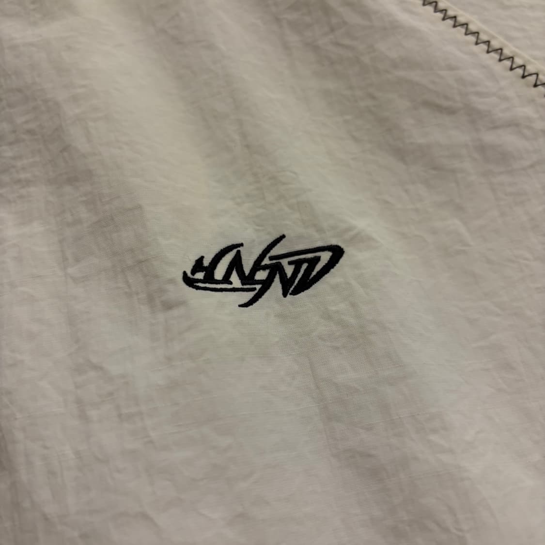 [L] 낫포너드 빅로고 아이보리색 바람막이 점퍼 B478 상품이미지4