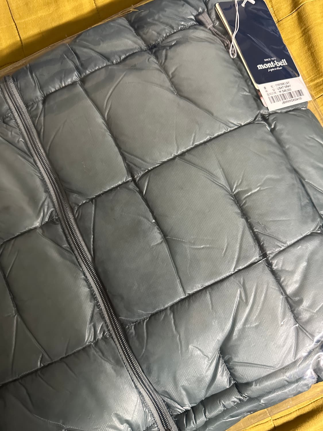 몽벨 플라즈마 1000 알파인 다운 파카 라이트그레이 라지 새제품 판매 상품이미지2