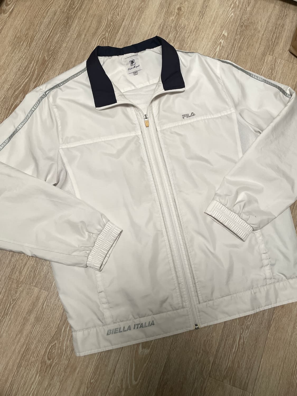 휠라 화이트 실버 바람막이 자켓 상품이미지1