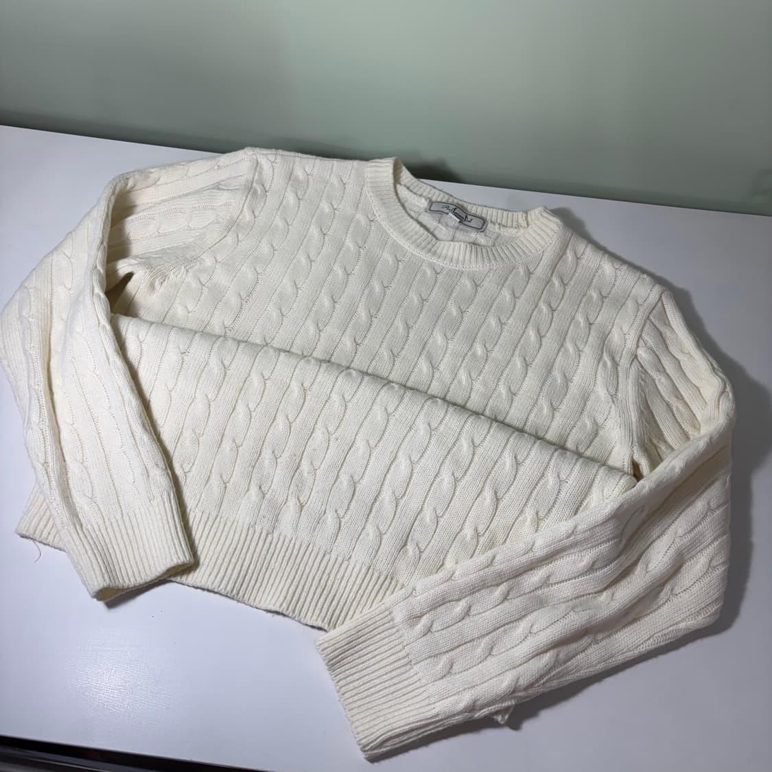 95 앤더슨벨 크림 꽈배기니트 상품이미지1