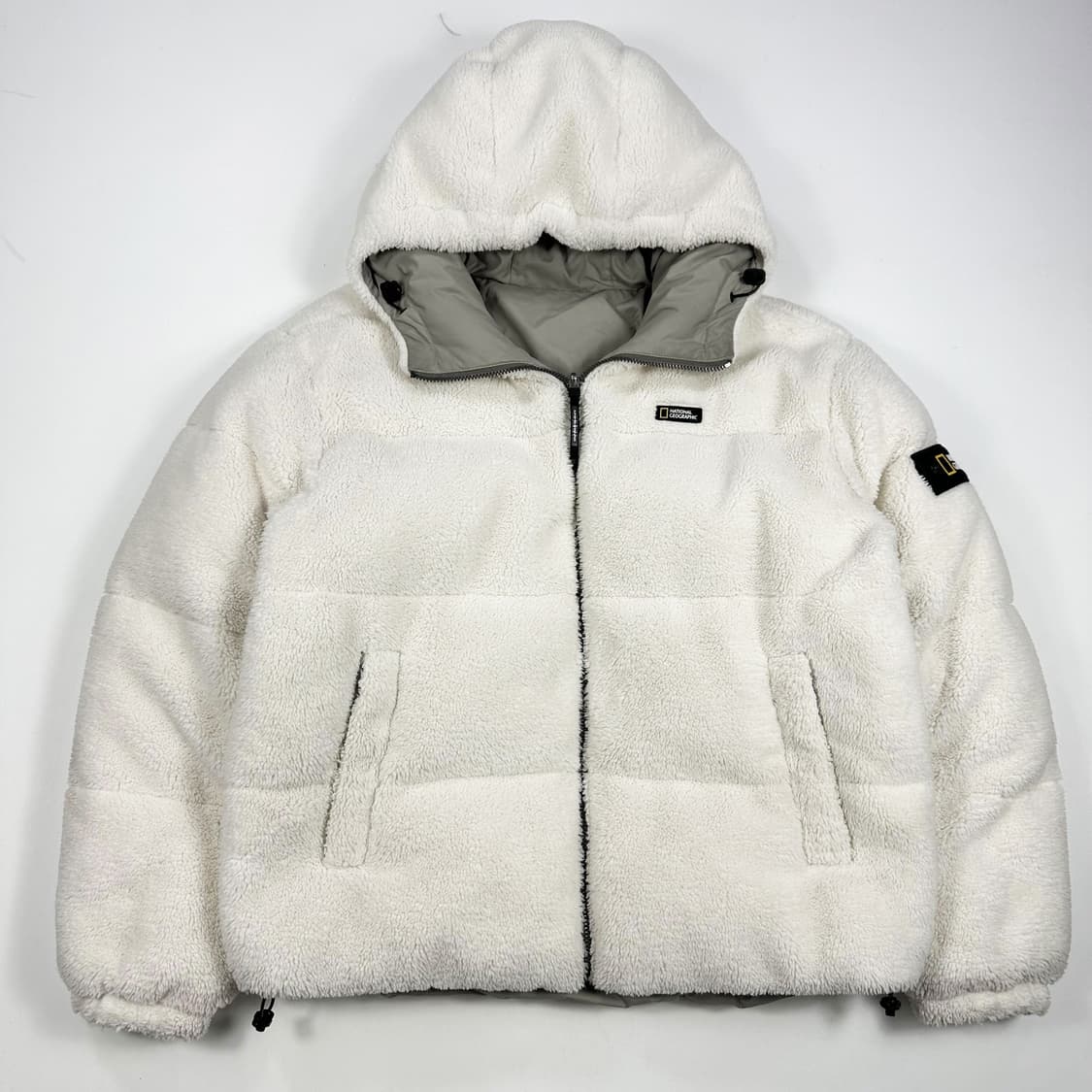 내셔널지오그래픽 뽀글이 와펜 리버시블 패딩 M 상품이미지1