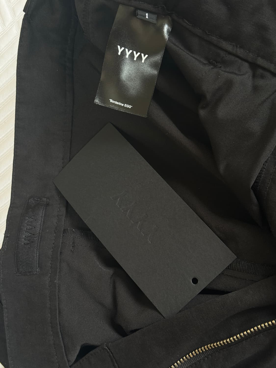 [착용 1회] YYYY 패디드 스티치 플레어 팬츠 블랙 상품이미지8