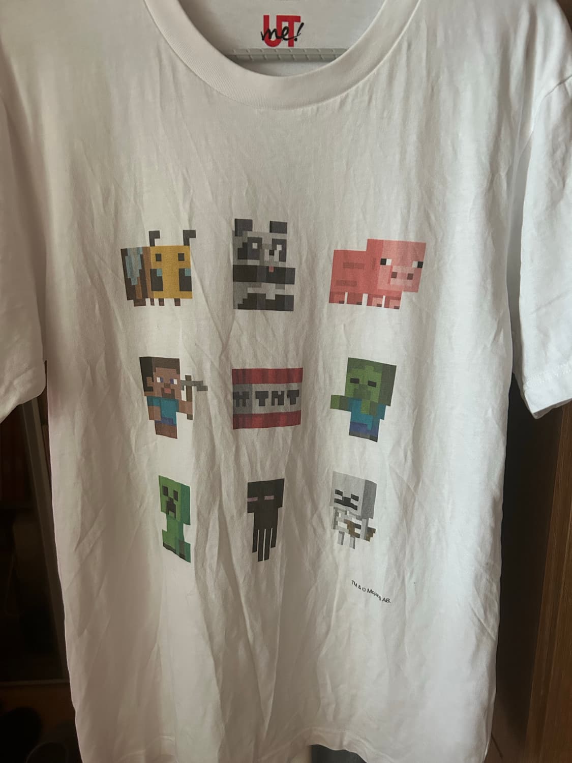 (새상품급)유니클로 커스텀 마크 티 상품이미지1