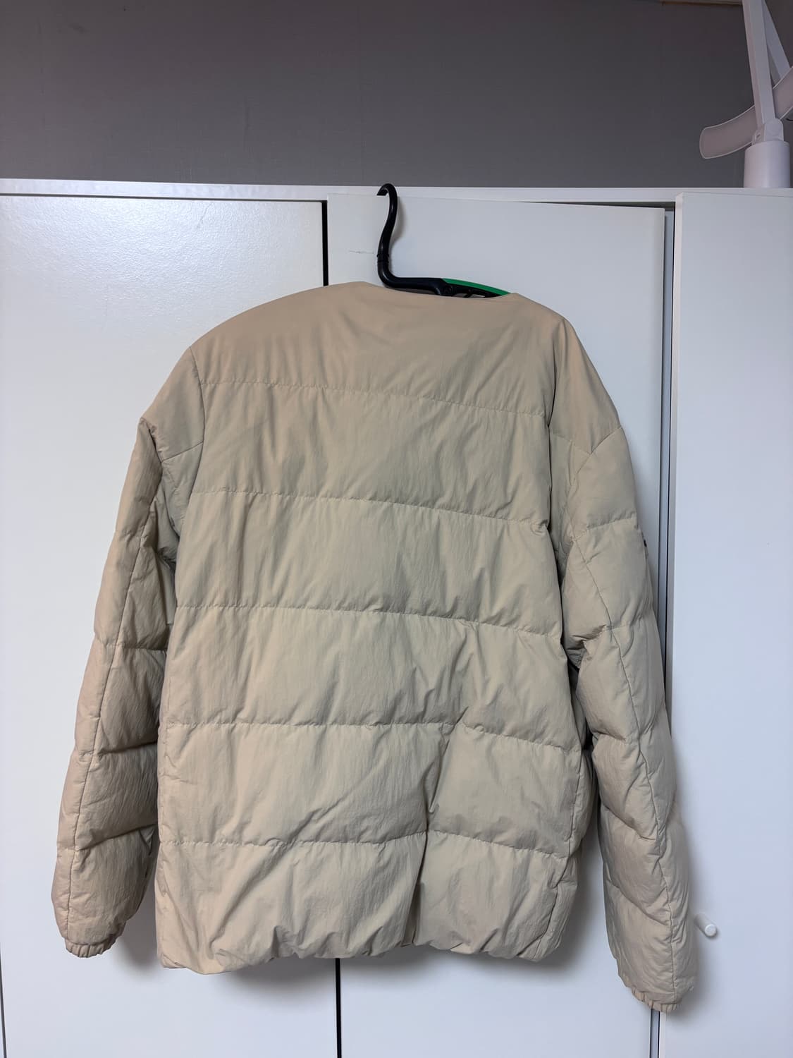 디스커버리 베이지 경량패딩 95 상품이미지2