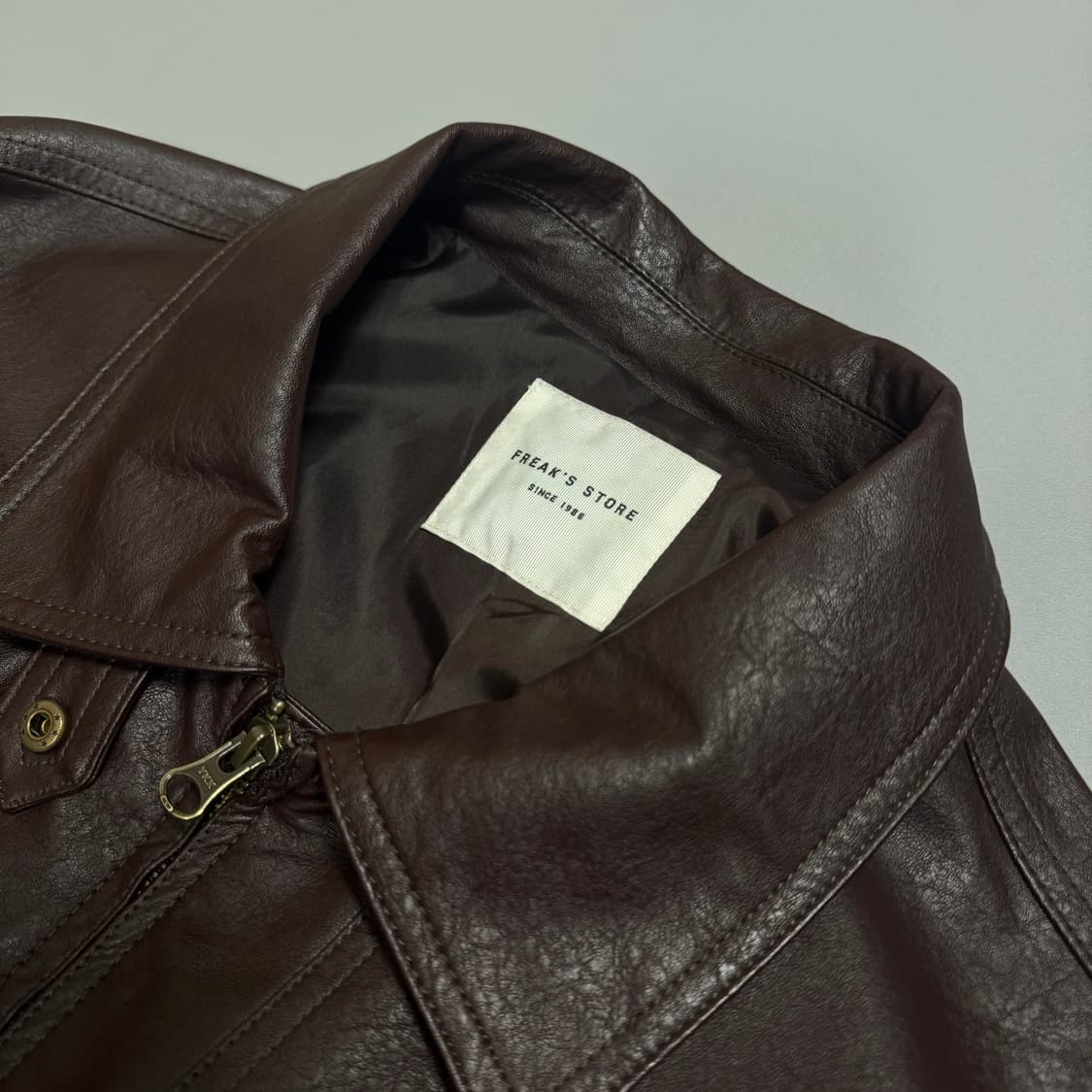 프릭스스토어 다크브라운컬러 드롭숄더 2way 칼라넥 레더 자켓 상품이미지3