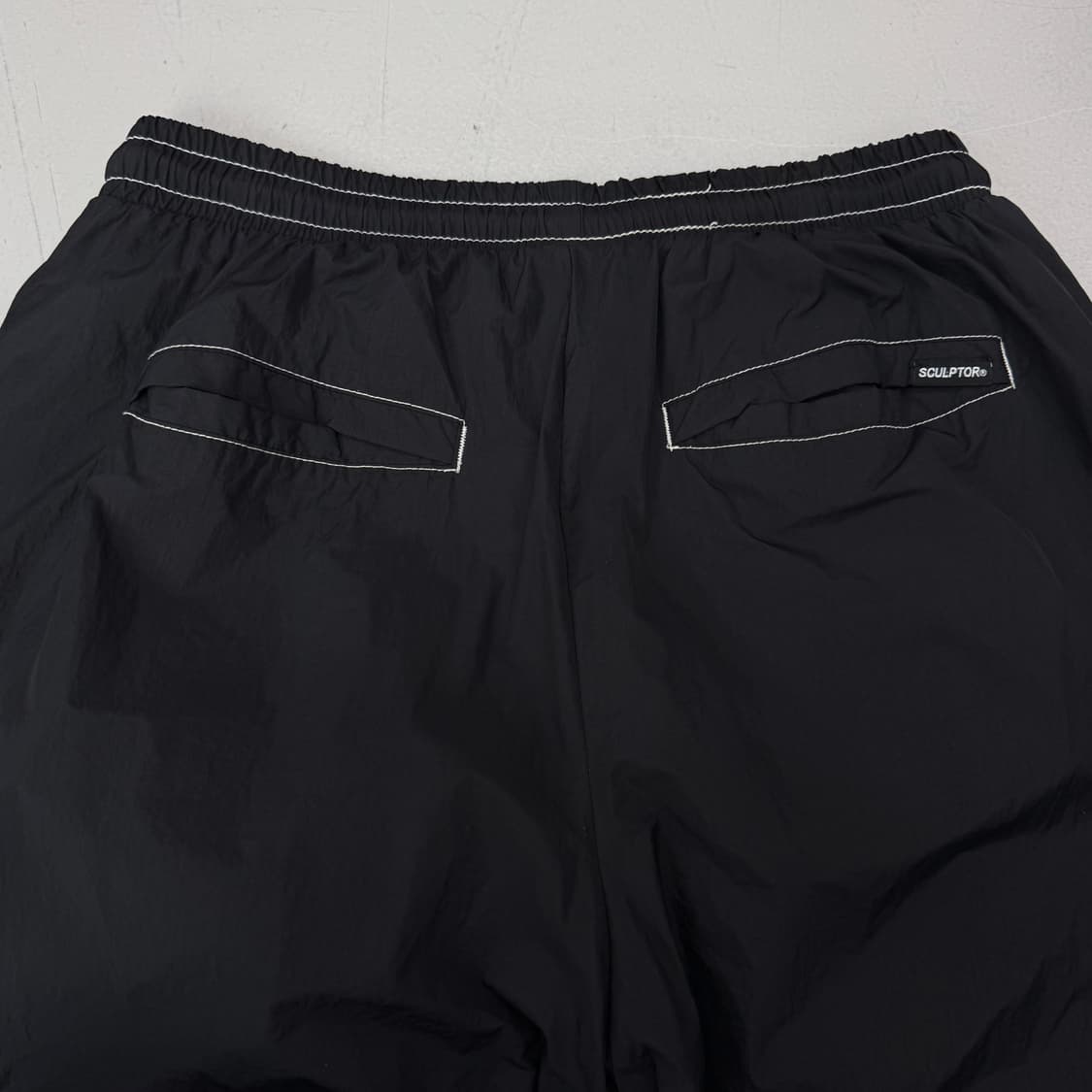 스컬프터 스티치 나일론 바람막이 트랙팬츠 상품이미지4