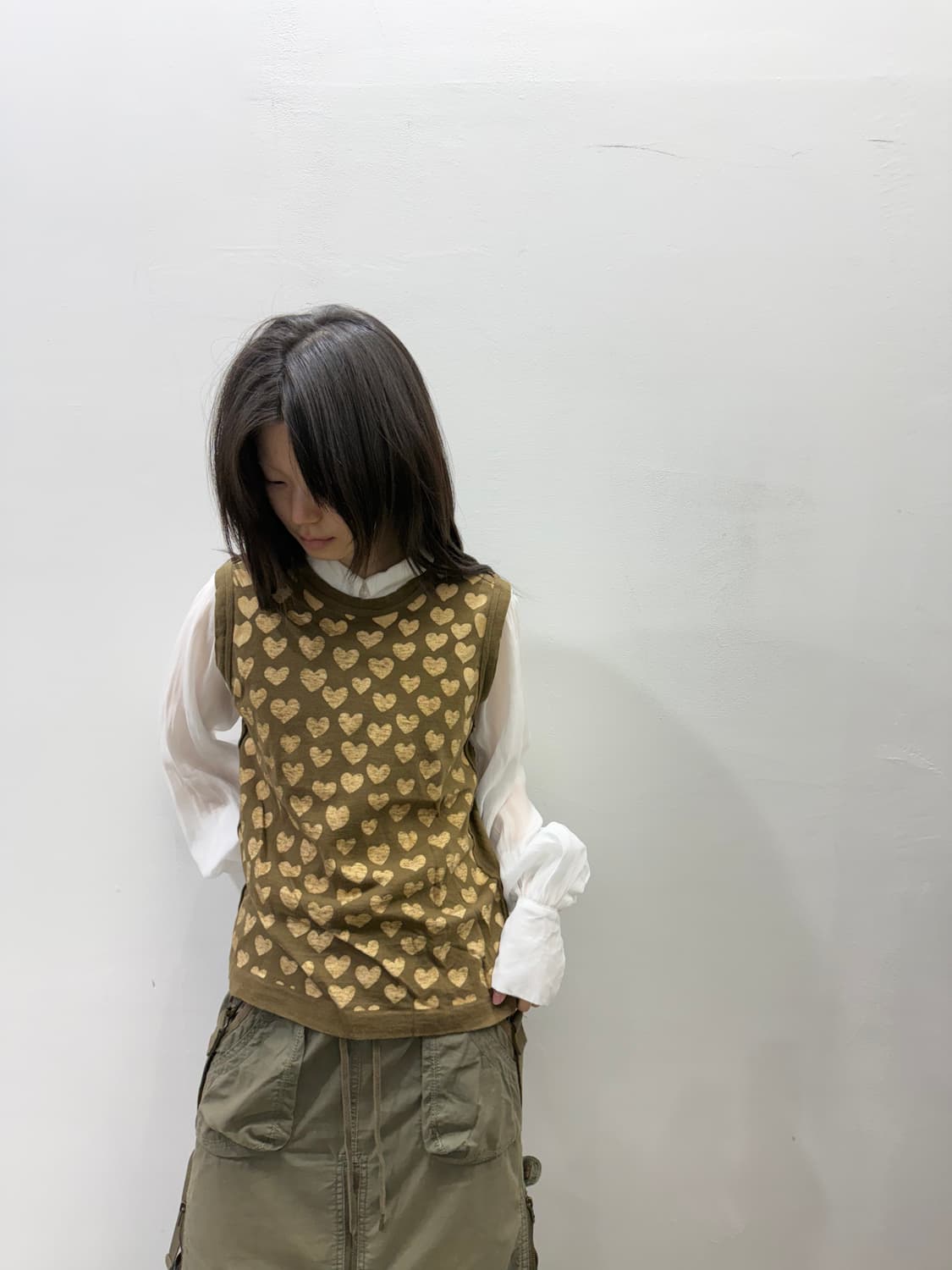 꼼데가르송 하트 패턴 코튼 슬리브리스 탑 상품이미지1