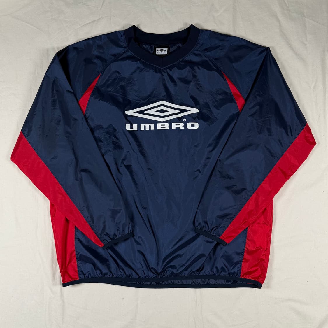 엄브로 웜업 피스테 바람막이 상품이미지1