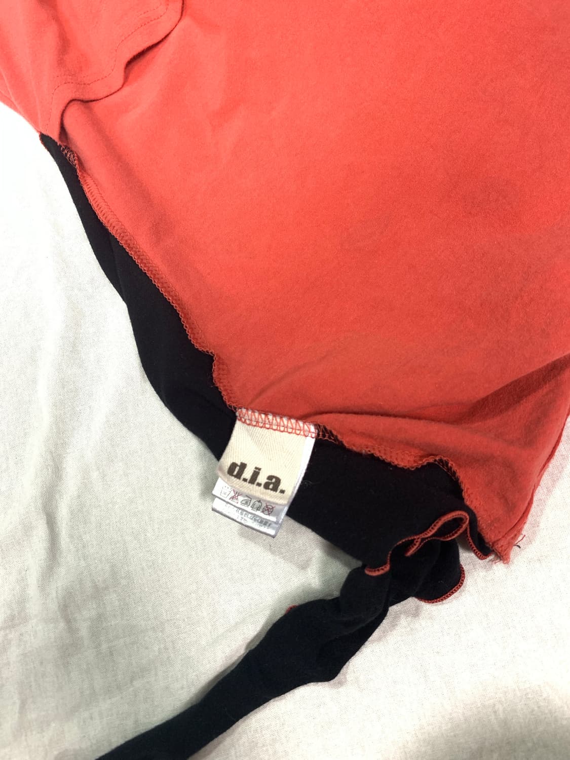 d.i.a skull detail unbalanced top 상품이미지8