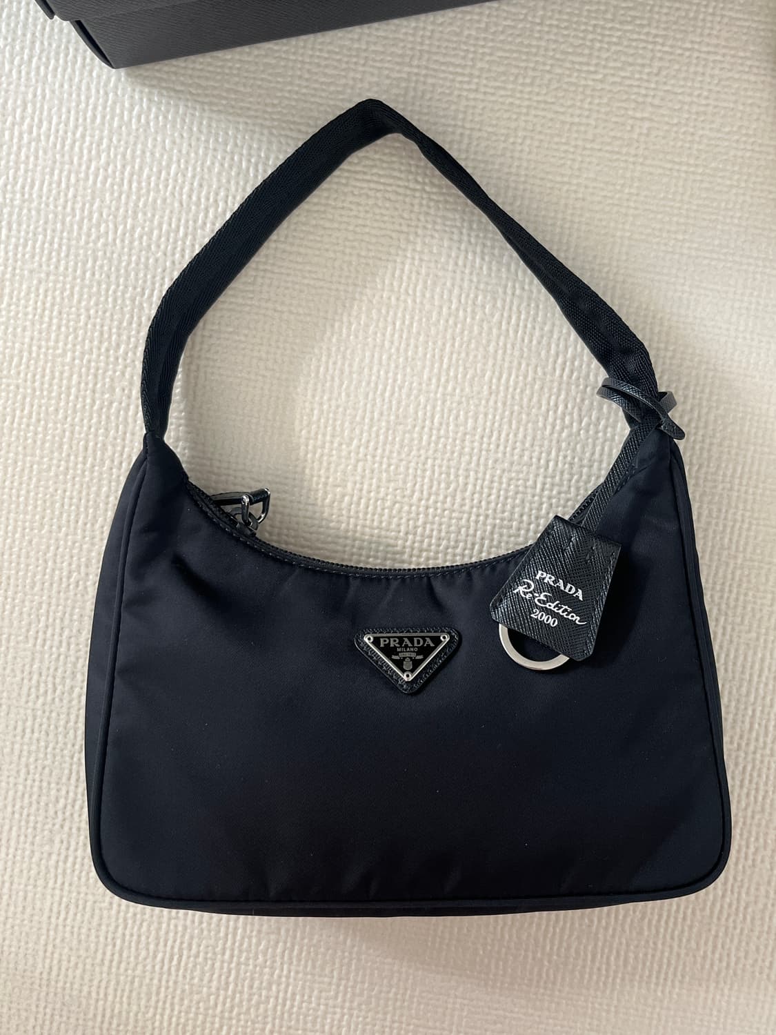 정품 프라다 리나일론 미니백 상품이미지1