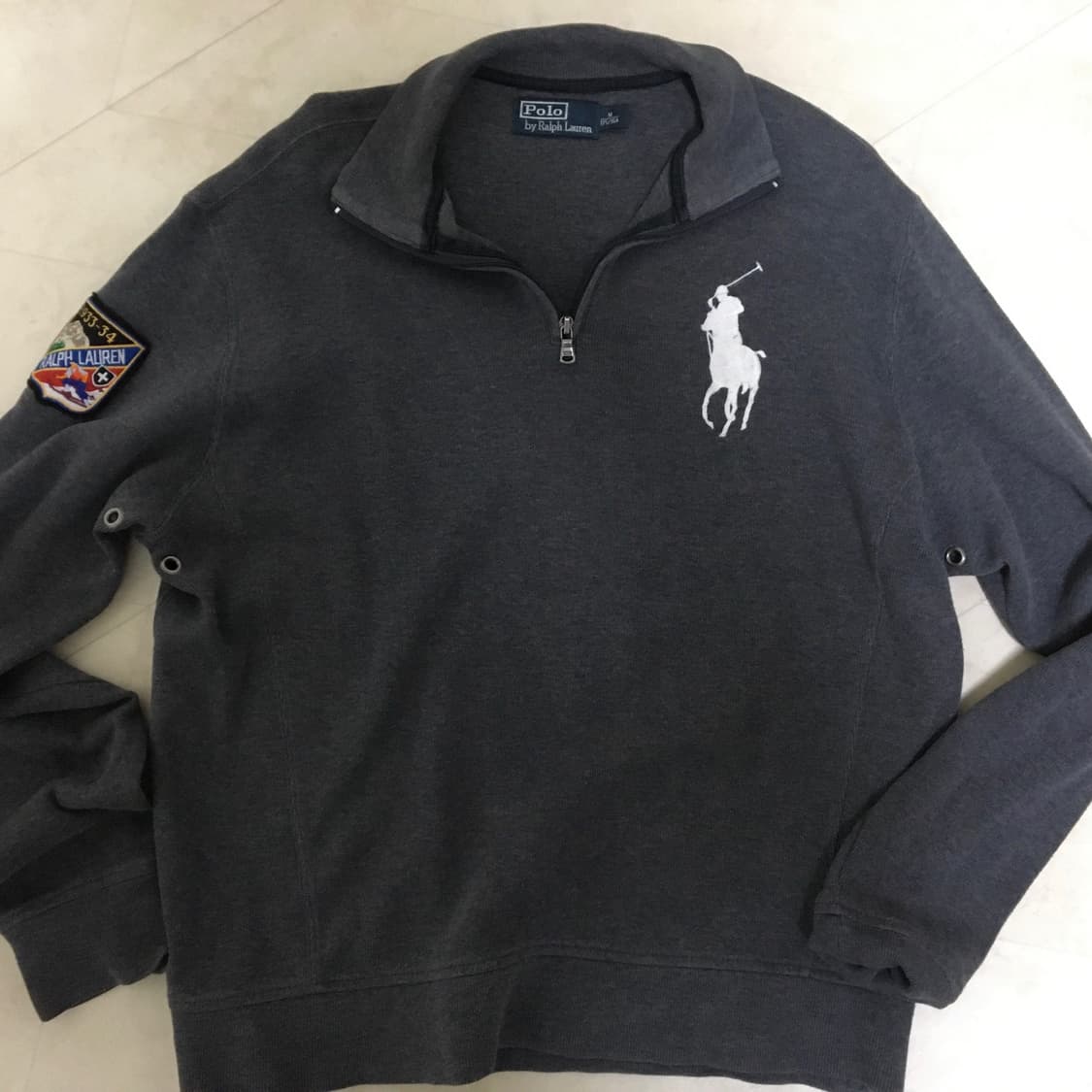 폴로 니트 반집업 상품이미지1