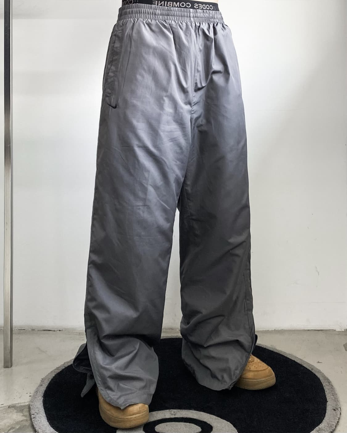 나이키 2002‘s 스우시 플리스 라이닝 우븐 팬츠 상품이미지1