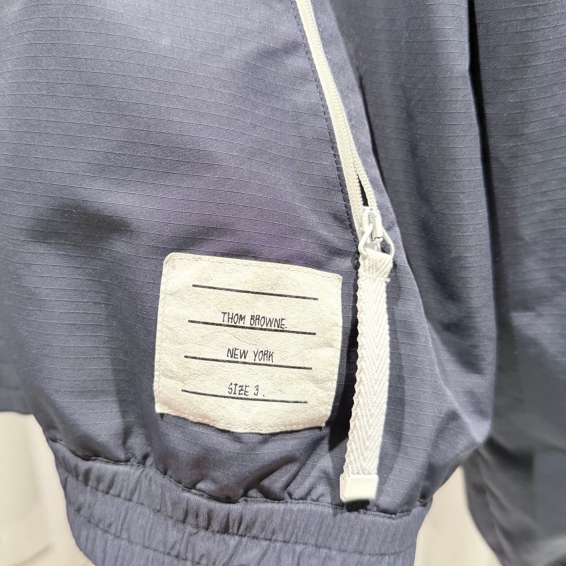 (A+/3) / 톰브라운 사선완장 립스탑 메쉬 네이비 바람막이 상품이미지5