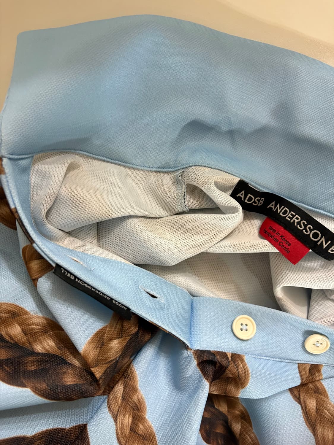 앤더슨벨 헤어 브래이드 스트라이프 카라 티셔츠 XS 상품이미지3