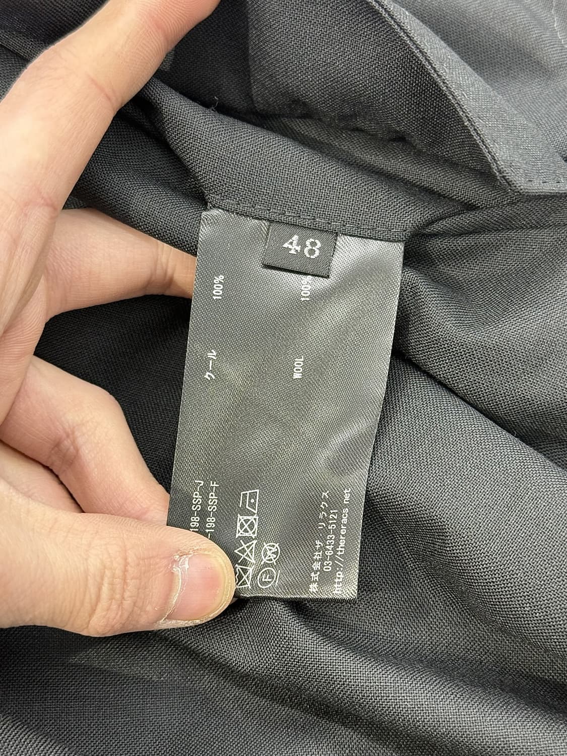 더 리라쿠스 블랙 테이퍼드 드로즈 백 포켓 울 팬츠 상품이미지8