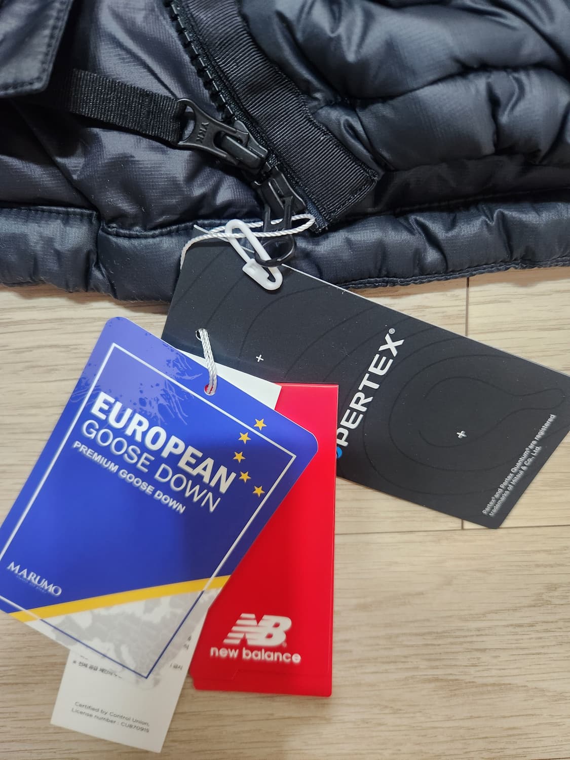 [뉴발란스 x 이스트로그] 구스다운 중경량패딩 블랙 XL 상품이미지8