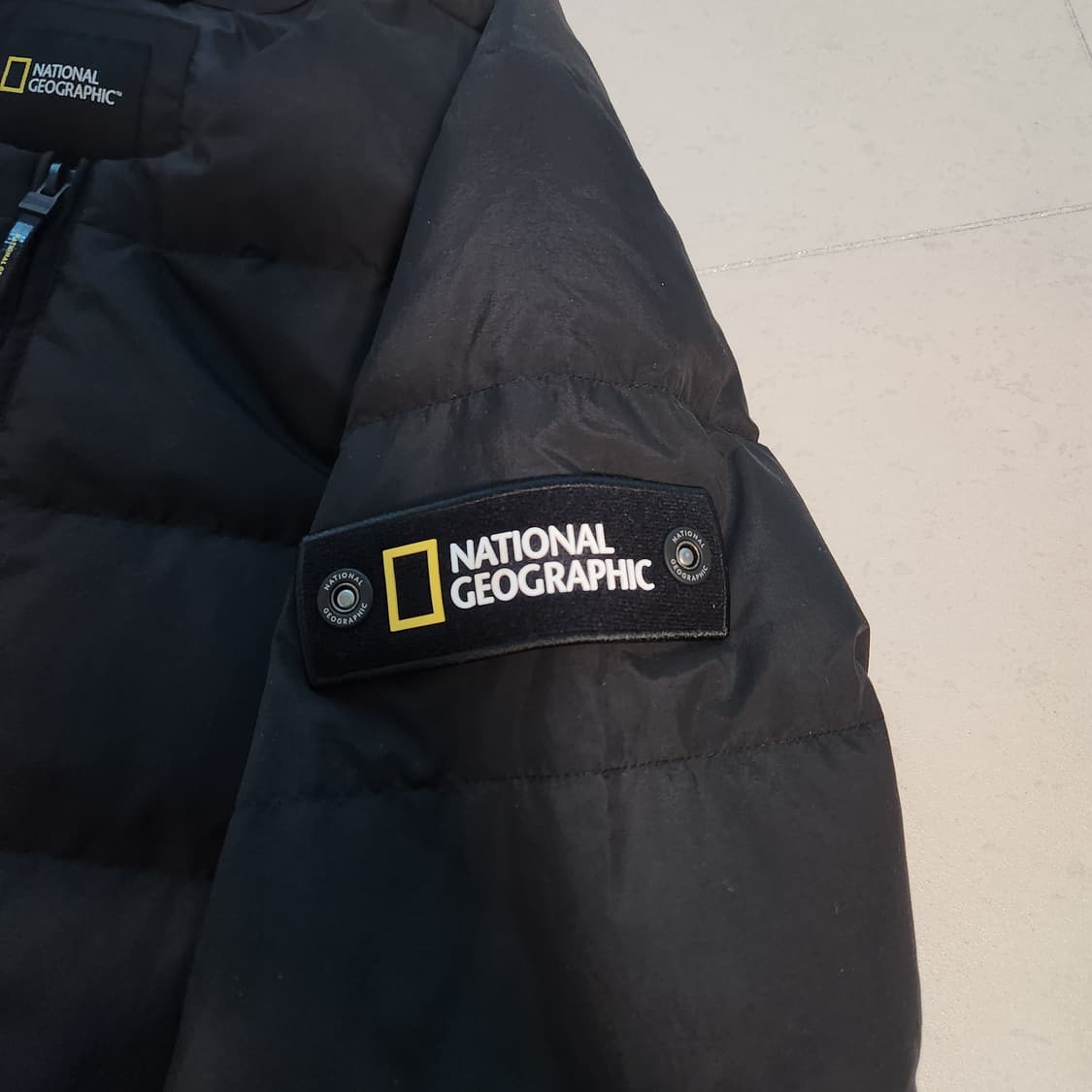 내셔널지오그래픽 와펜 블랙 경량패딩 상품이미지4