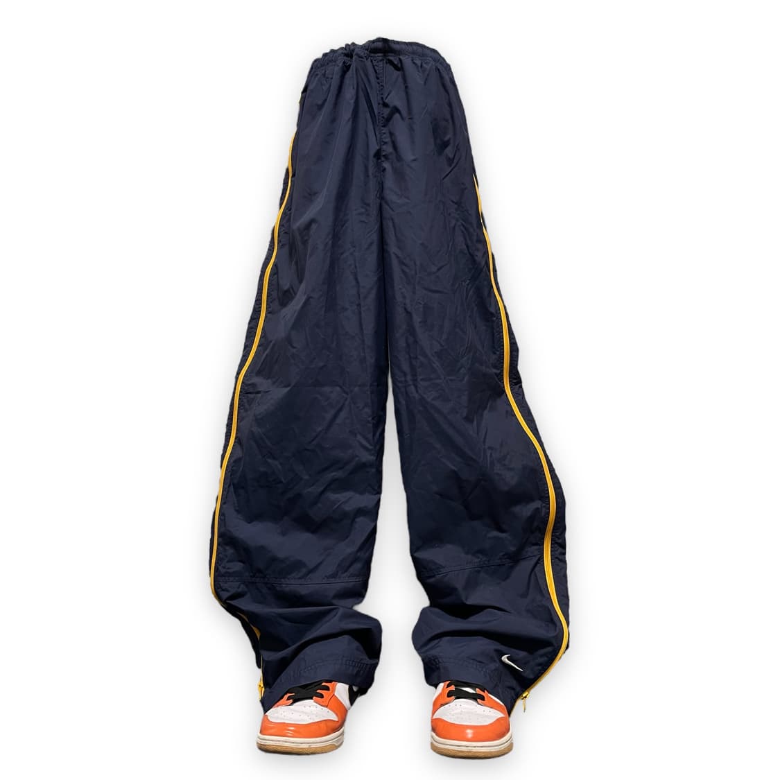 [m] 나이키 투웨이 사이드 짚 트랙팬츠 상품이미지1