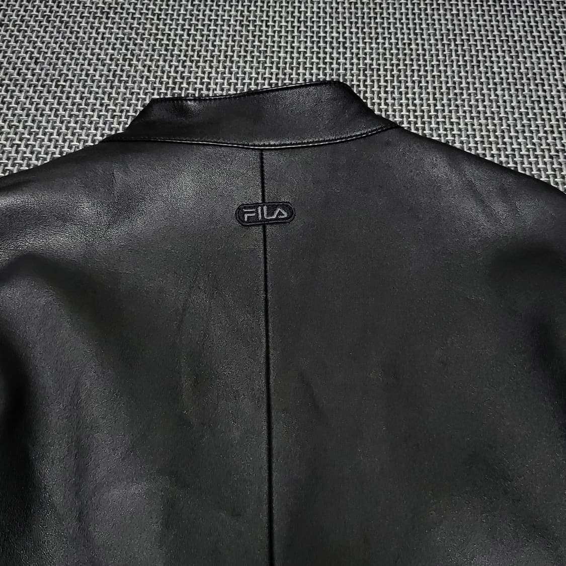 (여성) 휠라 양가죽 리얼레더 사이드라인 바이커 자켓 (90) 상품이미지4