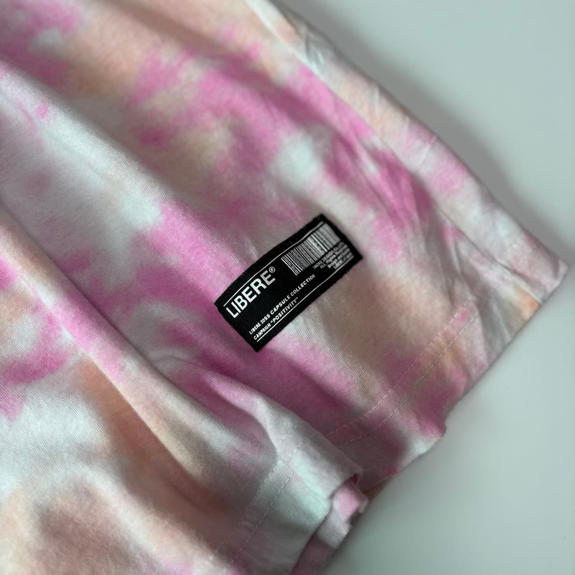 리베르(LIBERE) 핑크 타이다이 슬로건 그래픽 티셔츠 상품이미지3