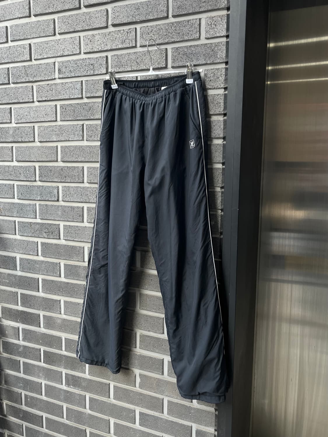 COURREGES 꾸레쥬 로고 트랙팬츠 블랙 상품이미지5