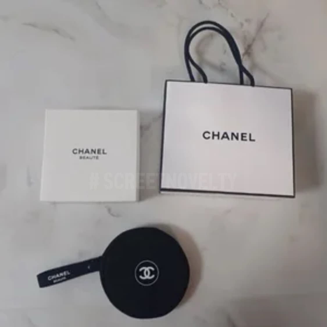 샤넬뷰티  블랙원형 미니파우치 동전지갑 스트랩  상품이미지4