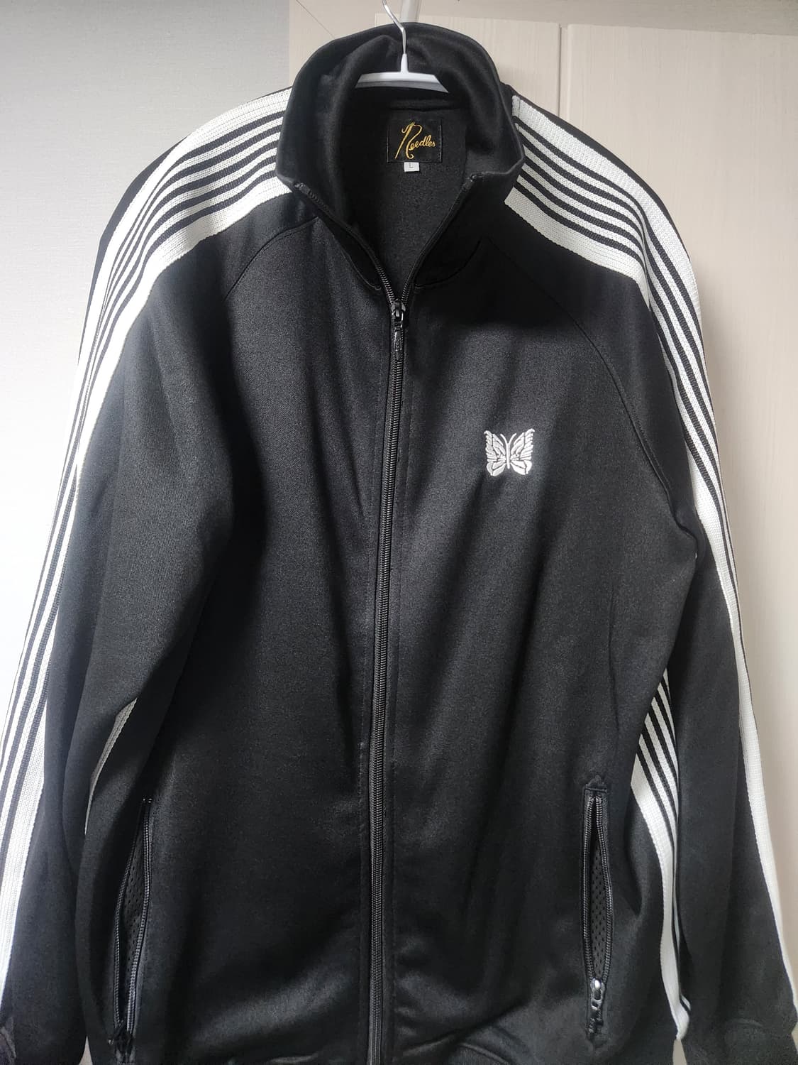 니들스 트랙집업 상품이미지1