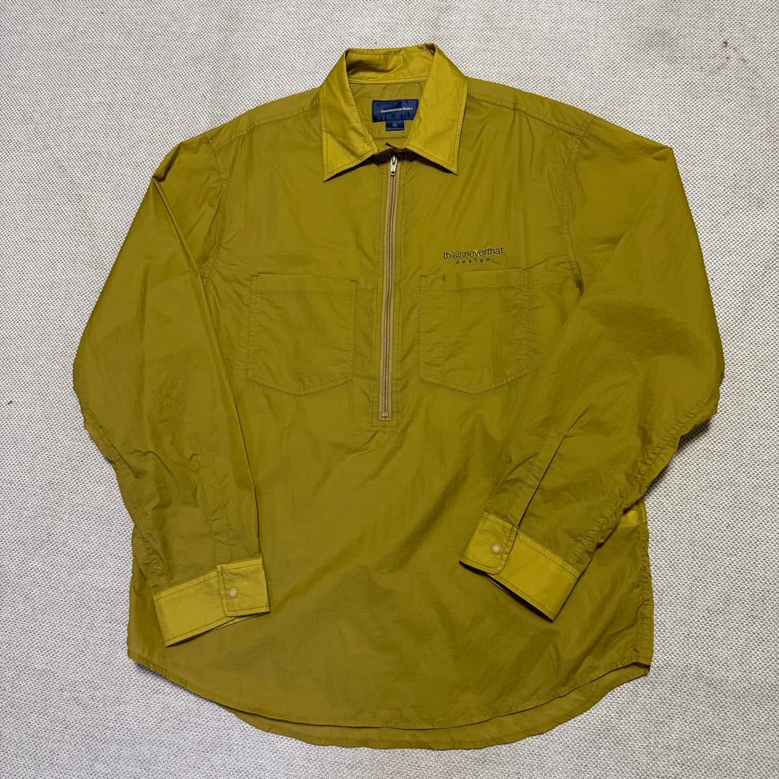 디스이즈네버댓 하프집업 나일론 셔츠 상품이미지1