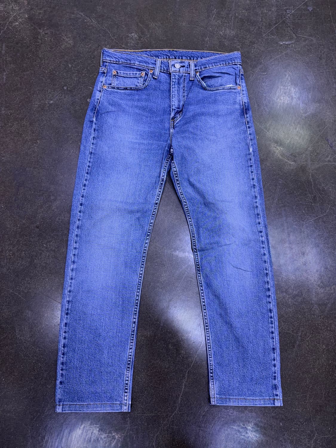 리바이스 502 레귤러 테이퍼드핏 중청 워싱 데님팬츠 32 상품이미지1