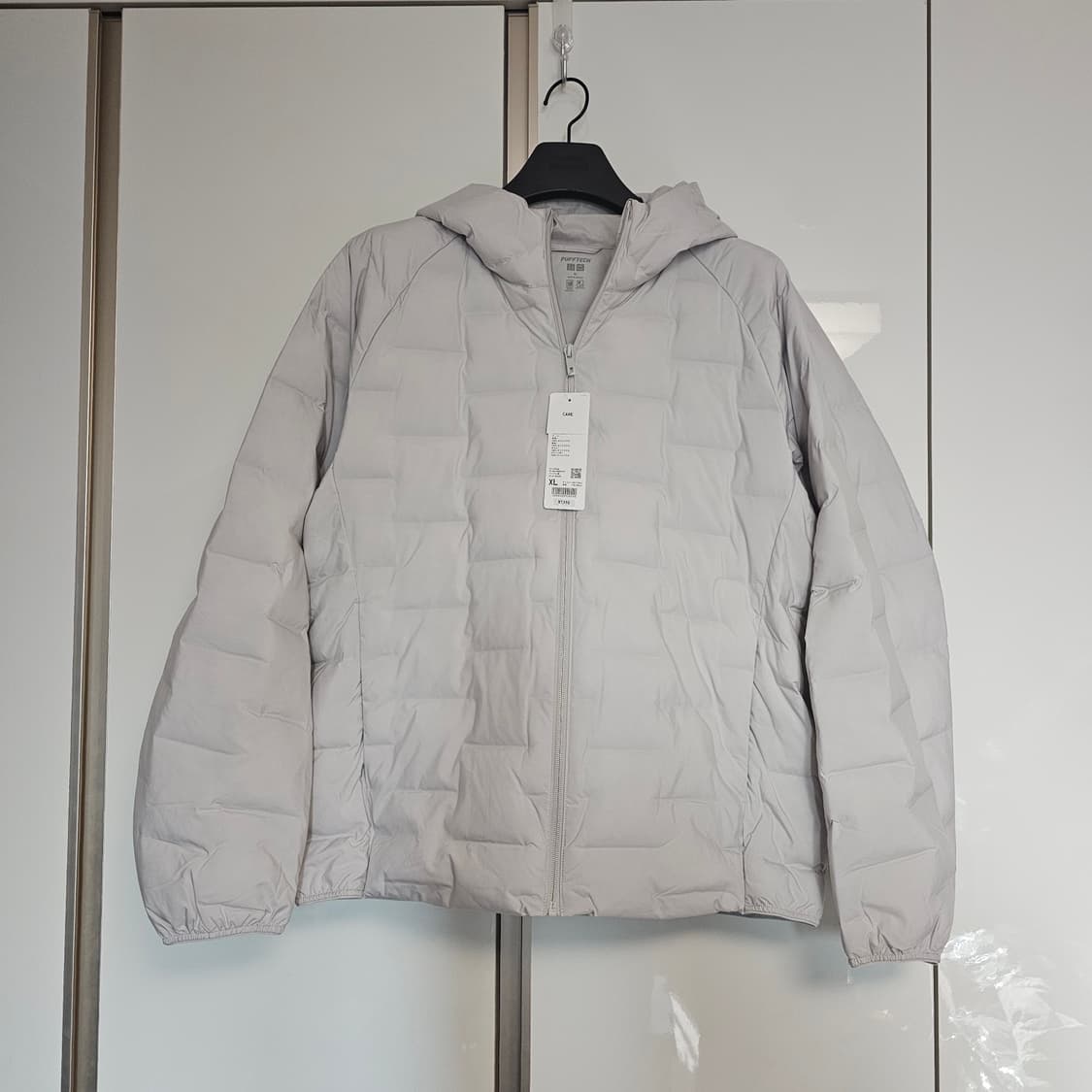 JP XL 새제품) 유니클로 퍼프테크 퍼프텍 경량 패딩 파카 오프 화이트 상품이미지1