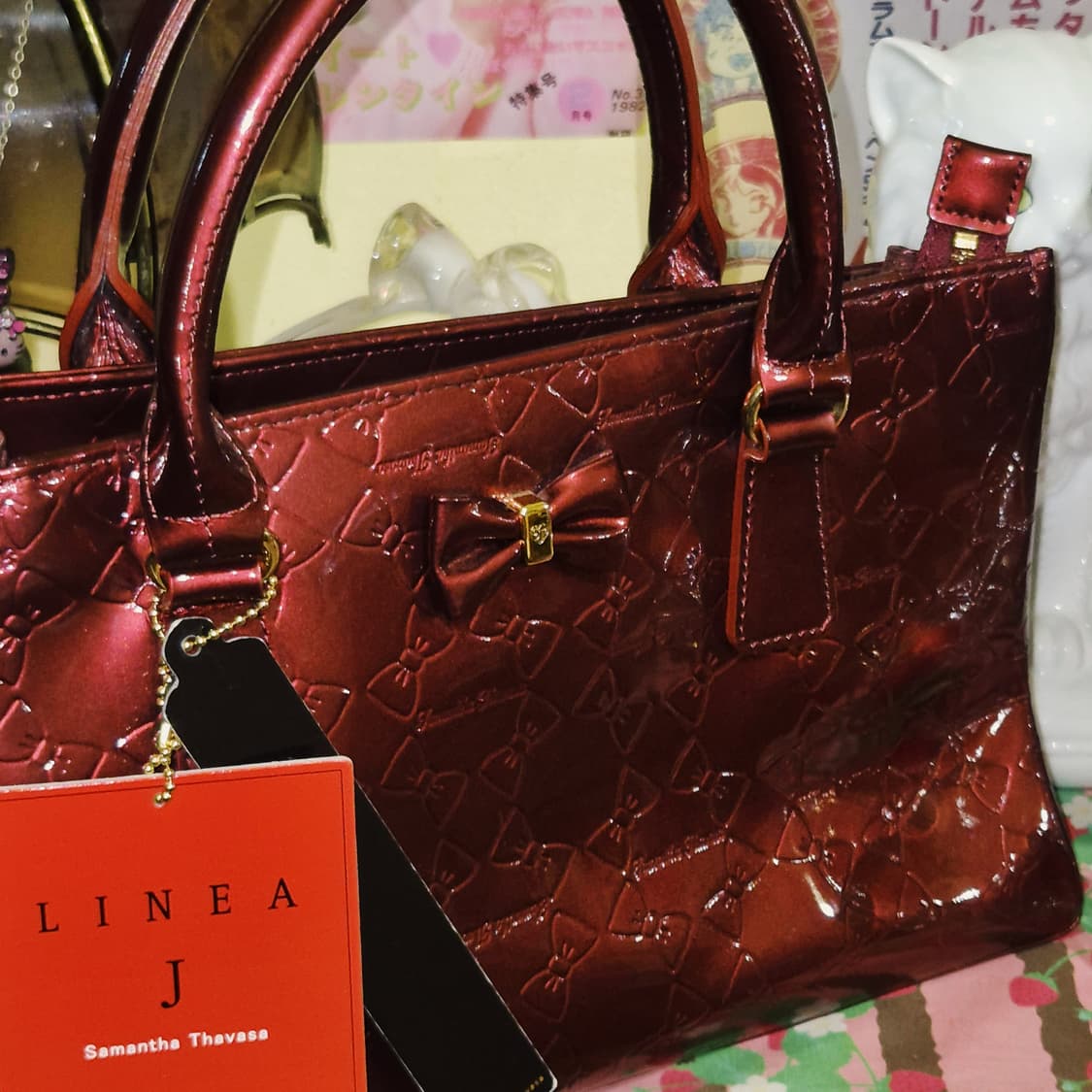 09s 사만다타바사 키티 리본 엠보 레더 토트백 상품이미지9