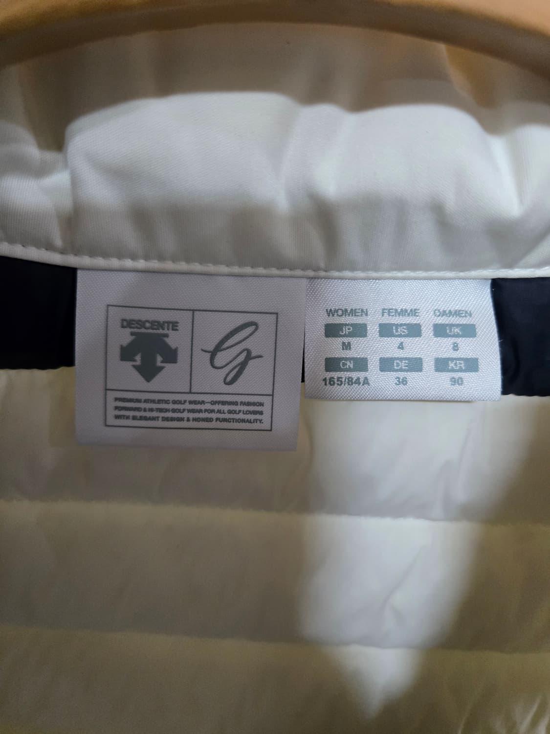 데상트 골프 여성  구스패딩 조끼 화이트/네이비M 상품이미지4