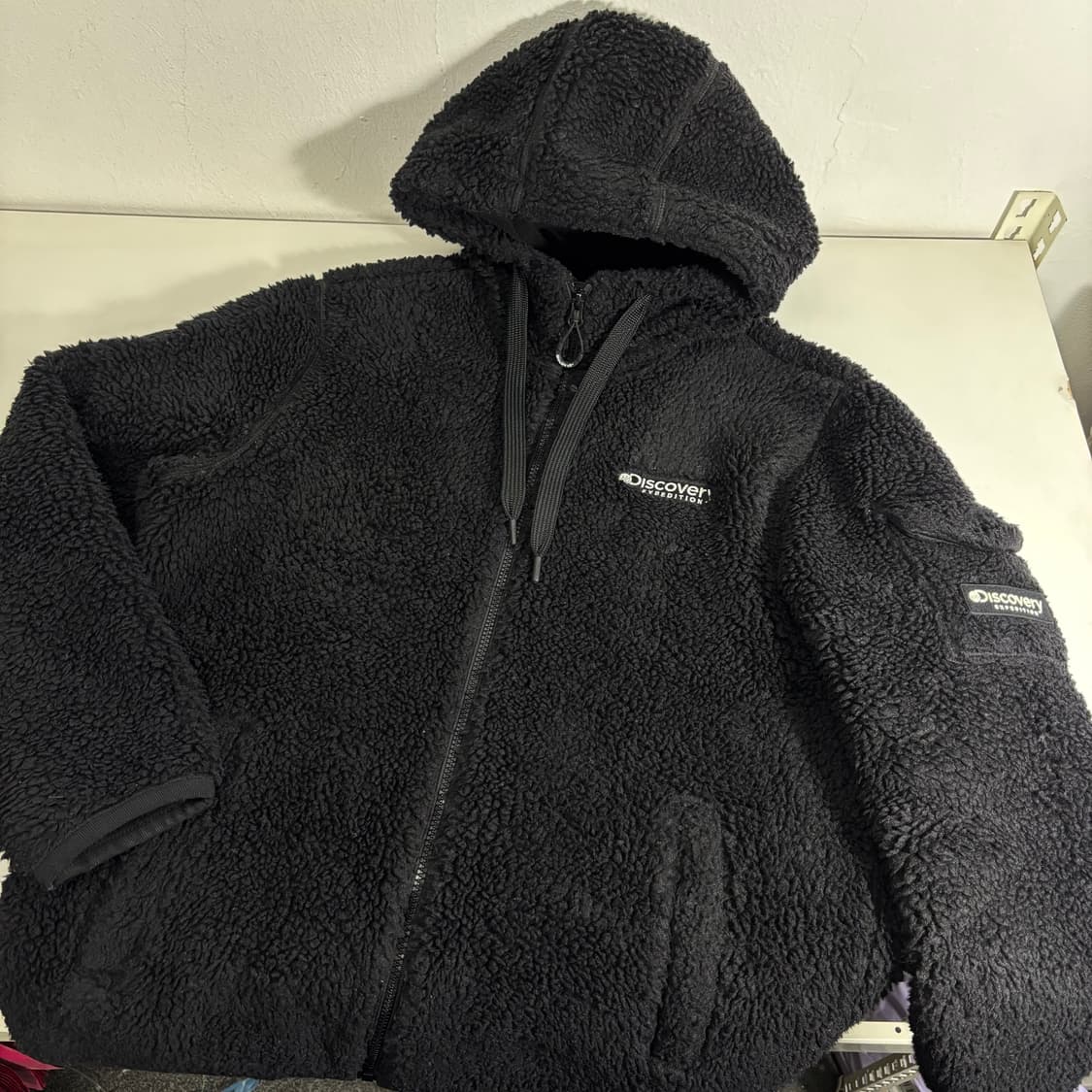 100 디스커버리 블랙 뽀글이 후리스 후드집업 상품이미지1