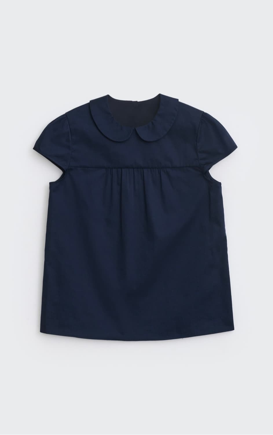 코스모스 셔링 캡 슬리브 블라우스 네이비 상품이미지1